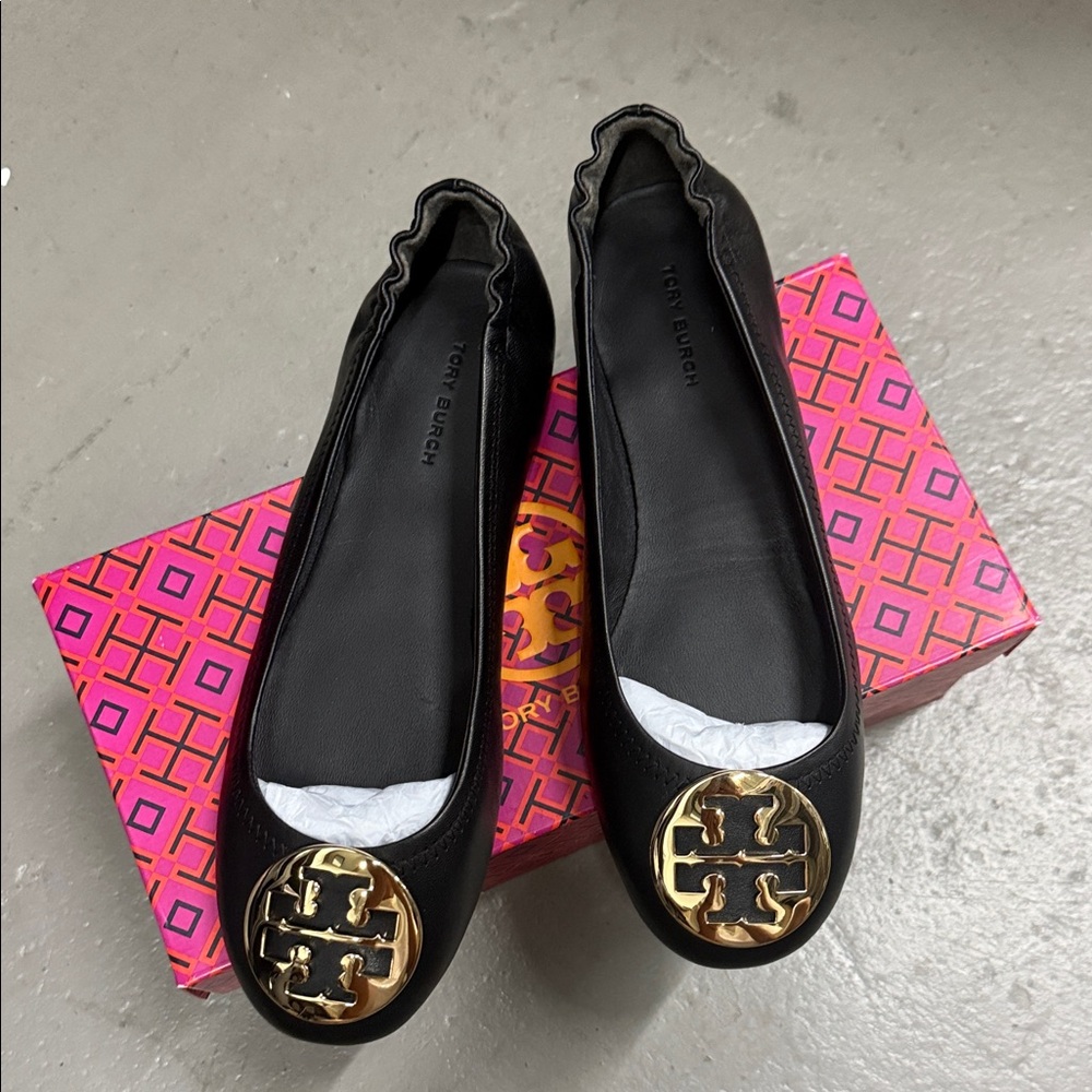 Tory Burch Black Flats with Gold Emblem - Picture 1 of 8